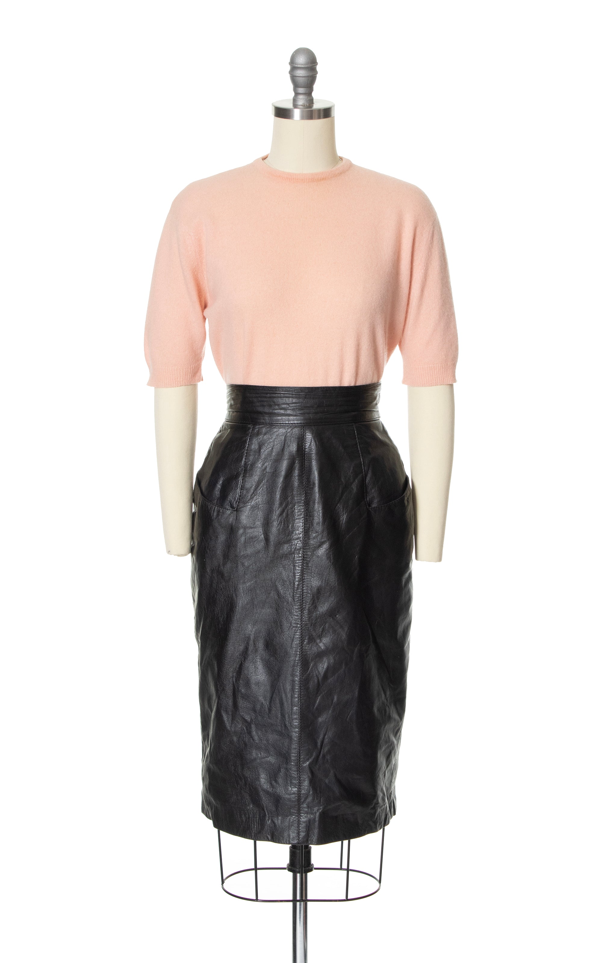 Black leather pencil skirt with outlet pockets