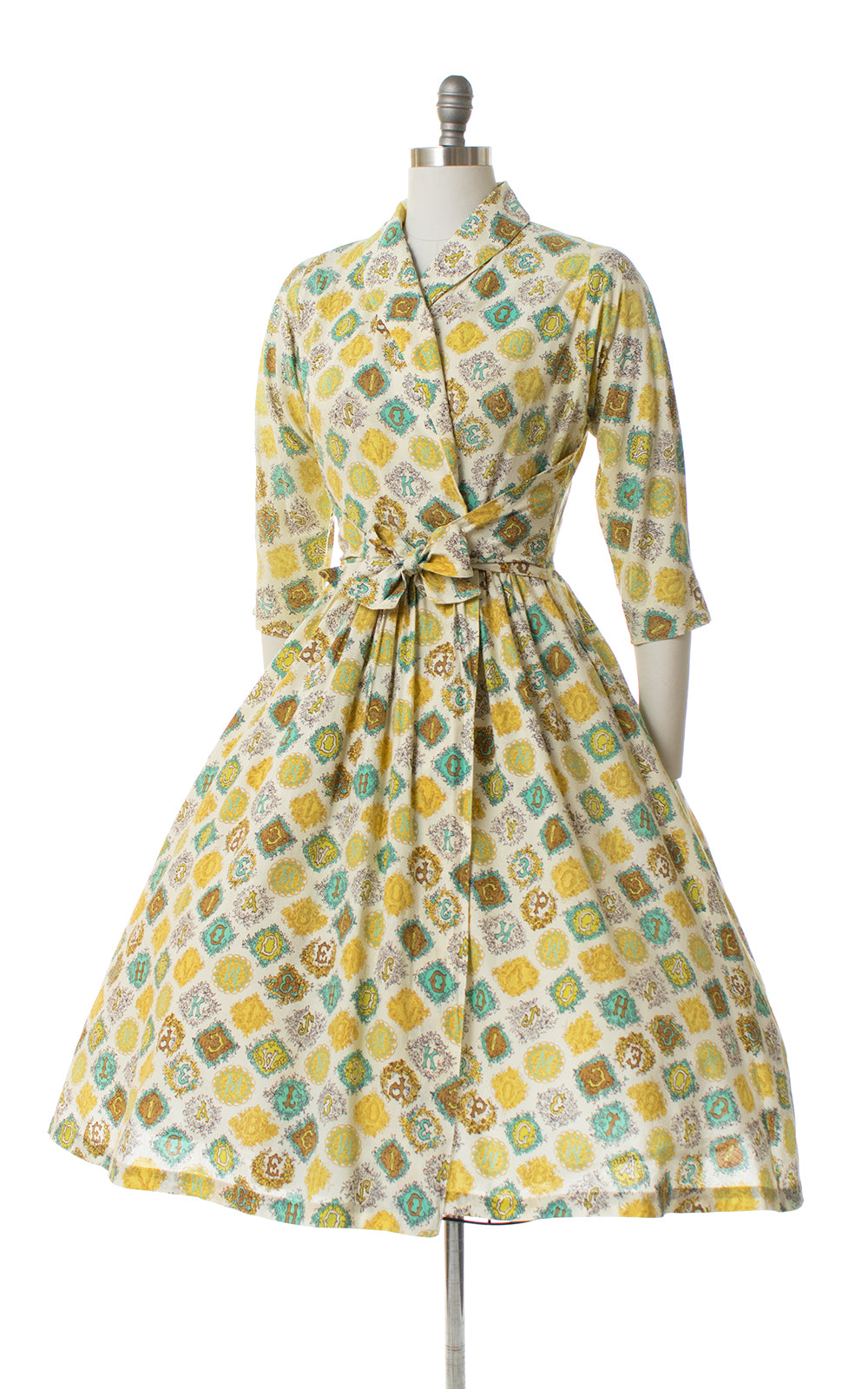 1950s ABCs novelty print wrap dress
