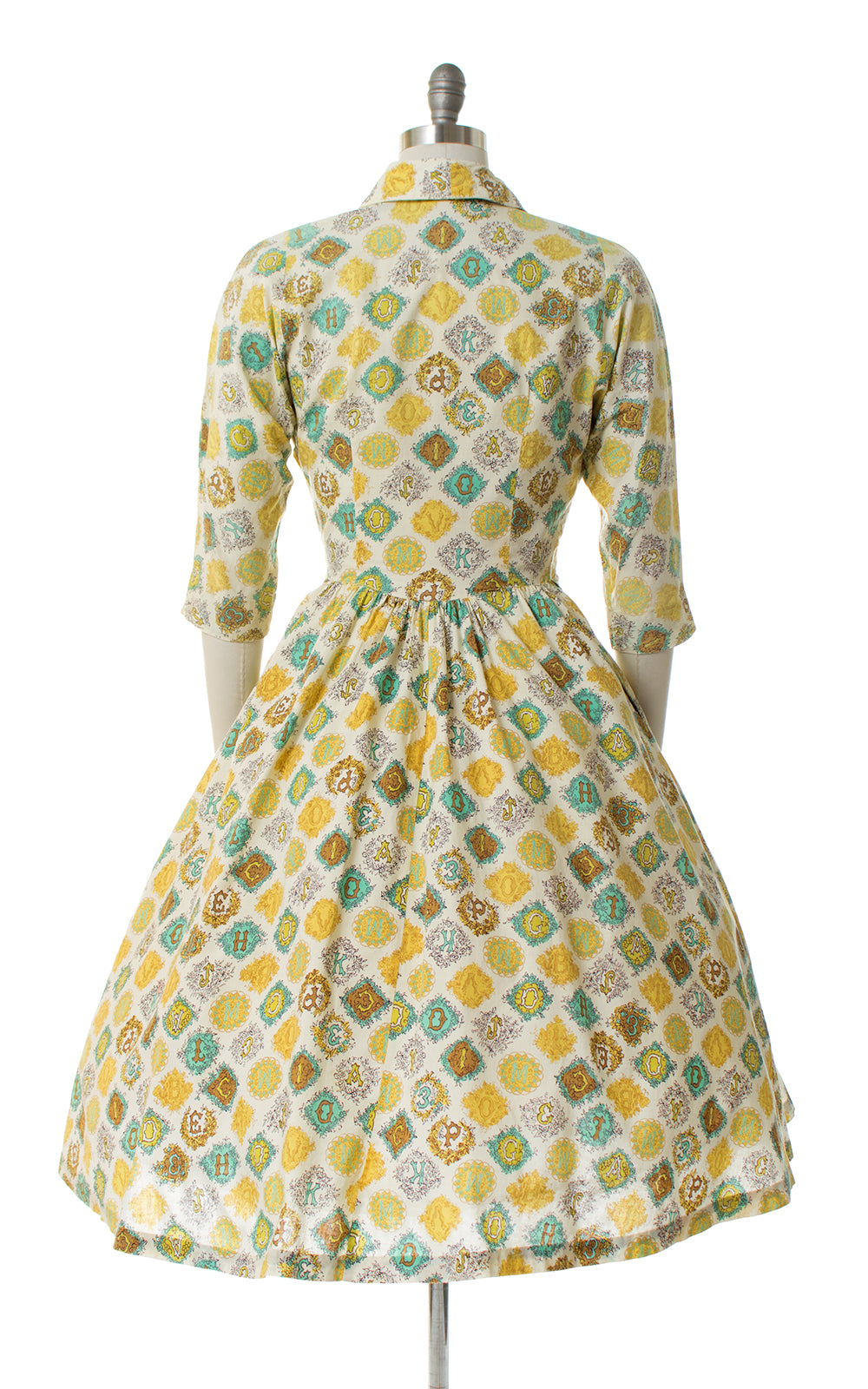 1950s ABCs novelty print wrap dress